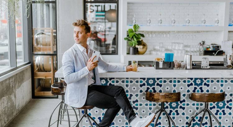 man sitting on stool